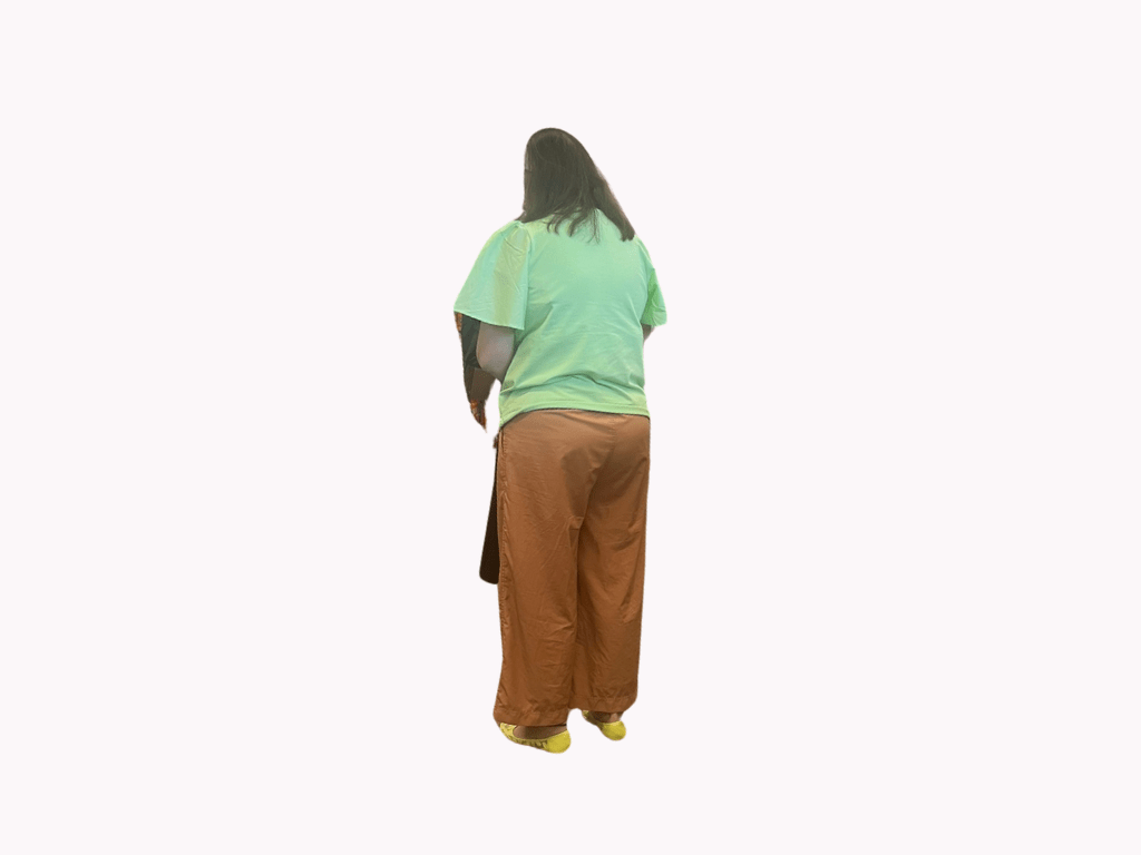 A woman wearing a wide leg pant style.